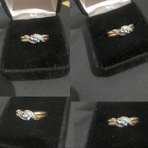 Gold and sterling silver ring with two stones